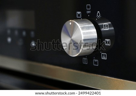 Oven knob controller with multi-function settings from side view