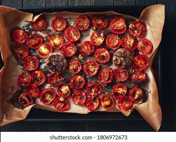 Oven Roasted Cherry Tomatoes On An Oven Tray. Overhead View.