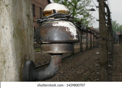 Over 70 Years Old Barbed Wire Fences And Porcelain Insulators In Oswiecim, Poland 