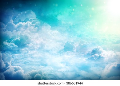 Over the Clouds. Fantastic background with clouds and sunlight beams