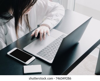 Over Head View From Asian Business Woman(30s To 40s) With White Shirt Put Her Smart Phone , Name Card Case And Use Computer Laptop For Support Her Business With Soft Focus Foreground (name Card Case)