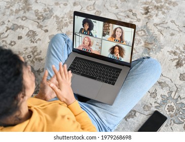 Over Shoulder Top View Of Adult Student Girl Having Virtual Meeting Video Call Chatting With Diverse People Friends Talking During Online Conference Call At Home Having Fun Of Friendly Communication.