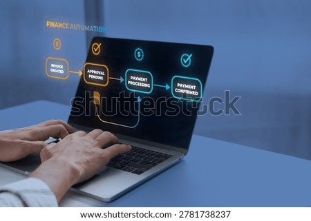 Over the shoulder view of a professional using a laptop showing a finance automation dashboard with glowing invoice creation, approval, and payment processing nodes. B2B fintech concept for automated corporate accounting and secure digital transactions.