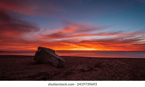 The over turned beach marker at sunrise on the beach in Vera Playa south eastern Spain - Powered by Shutterstock