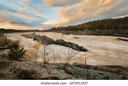 Over View Of Rapids Of Potomac River In Slow Motion At Sunset In Great Falls Park, Virginia. Great Falls Park Is A Small National Park Service Site In Virginia Near Washington DC, United States.