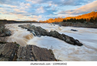 Over View Of Rapids Of Potomac River In Slow Motion At Sunset In Great Falls Park, Virginia. Great Falls Park Is A Small National Park Service Site In Virginia Near Washington DC, United States.