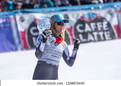 Overall FIS Alpine ski Super G winner US Mikaela Shiffrin celebrates the podium ceremony after competing in the Women's Super G race during the FIS Alpine ski world cup championship on March 14, 2019