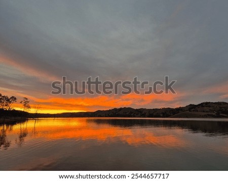 Similar – Image, Stock Photo Fiery Sunset Sky over Miami Pier
