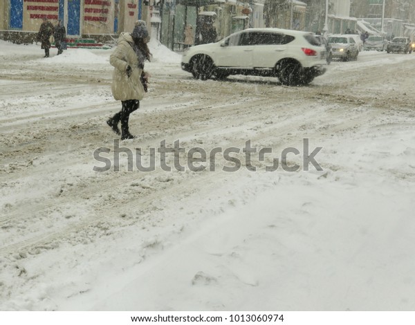 Overcast. Natural\
disasters winter, blizzard, heavy snow paralyzed city car roads,\
collapse. Snow covered\
cyclone