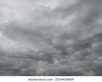 Overcast sky with dark gray clouds forming a moody and dramatic atmosphere, perfect for weather-related or nature-themed visuals. - Powered by Shutterstock