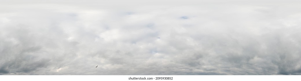 Overcast sky panorama on sunset with Cumulus clouds in Seamless spherical equirectangular format as full zenith for use in 3D graphics, game and aerial drone 360 degree panoramas for sky replacement