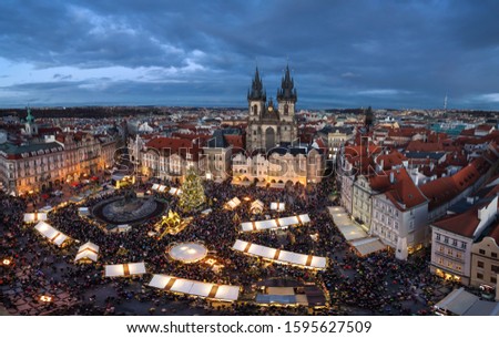 Overcrowded Christmas market on Old Town square (Staromestske Namesti) in the evening, Prague, Czechia