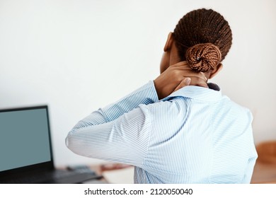 Overdoing It Doesnt Do You Any Favours. Cropped Shot Of A Businesswoman Experiencing Neck Pain At Work.