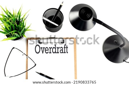 OVERDRAFT text on clipboard on the white background
