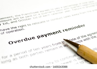 Overdue Payment Reminder With Wooden Pen