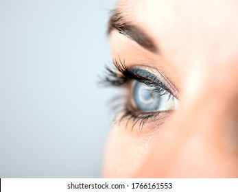 Overexposed Close Up Of A Young Woman's Right Eye In Side View