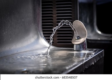 Overflowing Drinking Fountain.