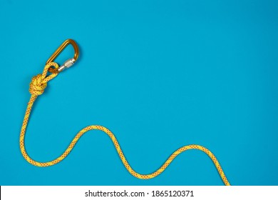 Overhand Knot With Orange Carabiner And Yellow Climbing Rope On 