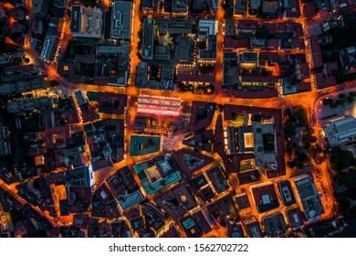 Overhead Aerial Drone Night Shot Of City Street Lights In Lugano, Switzerland