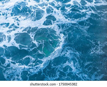 An Overhead Aerial Shot Of A Wavy Blue Sea - Perfect For Mobile