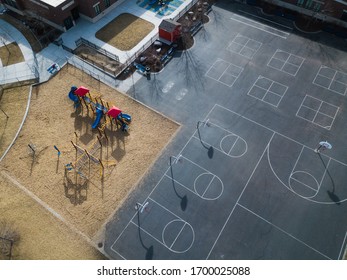 Overhead Aerial Of Vacant Elementary School Playground And Surrounding Area