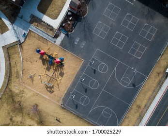 Overhead Aerial Of Vacant Elementary School Playground And Surrounding Area