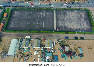 Overhead Aerial View Of Basketball And Tennis Courts On Eastbourne Seafront, Beach And Sports View