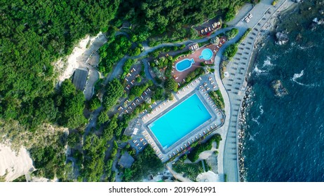 Overhead Aerial View Of Ischia Citara Beach At Sunset With Pools And Sand