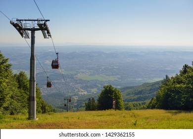 Overhead Cable Cars At Lower Station Of Cableway On Pohorje In Maribor, Slovenia, Mariborsko Pohorje Ski Slopes Are Popular Hiking Destination In Summer