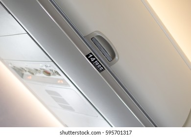 Overhead Compartment Signs Airplane Close Stock Photo 595701317 ...