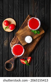 Overhead Composition With Salty Tomato Juice On Dark Wooten Table