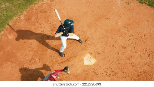 OVERHEAD CRANE Batter Baseball Player Hits A Ball Over A Home Plate