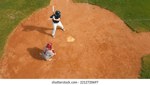 OVERHEAD CRANE Batter Baseball Player Hits A Ball Over A Home Plate