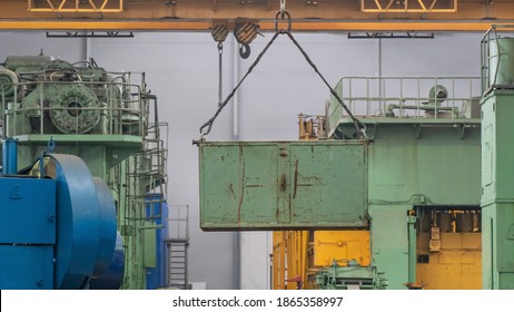 Overhead Crane Or Bridge Crane Include Hoist Lifting For Transportation, Manufacturing, And Production. Factory Warehouse Overhead Crane Lifts The Load,