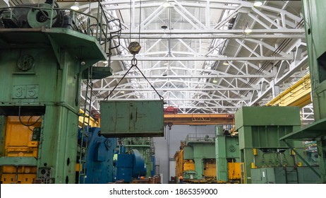 Overhead Crane Or Bridge Crane Include Hoist Lifting For Transportation, Manufacturing, And Production. Factory Warehouse Overhead Crane Lifts The Load,