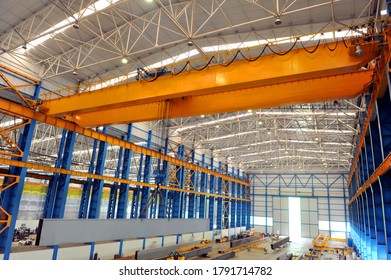 Overhead Crane And Concrete Floor Inside Factory Building For Industrial Background