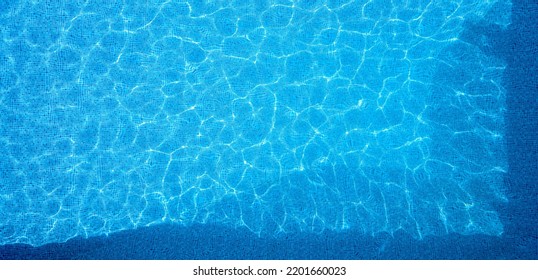 Overhead Drone Shot Of Clear Blue Water In Swimming Pool - Shutterstock ID 2201660023