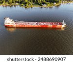 Overhead drone view of a Great Lakes freighter in Holland Michigan