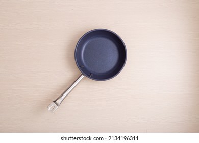 Overhead Empty Non Stick Pan On Table Top