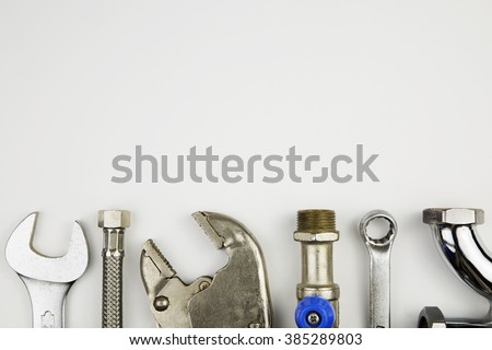 overhead of an essential tool kit for plumber / set of plumber tools