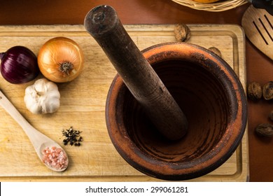 Overhead Food Shot With Mortar And Pestle On Cutting Board