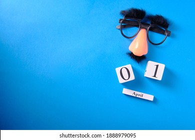 Overhead glasses with mustache, April 1, joke, fools day, top view, place for inscription