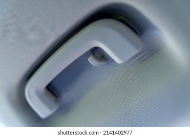 Overhead Grab Handle In Car, Showing Handle And Coat Hook.