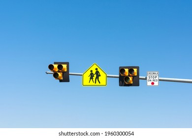 Overhead High Visibility Crosswalk Sign. The Traffic Control Device Is Officially Known As HAWK - High Intensity Activated CrossWalK Beacon.