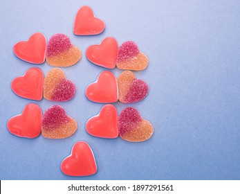 Overhead Photo Of Candy Hearts On A Light Blue Background