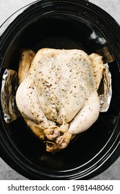 Overhead Photo Of A Cooked Whole Herb Chicken In A Crockpot