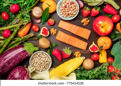 An Overhead Photo Of Fresh Vegetables, Fruits, Legumes, And Fish, Healthy Diet Ingredients, Shot From Above On A Dark Rustic Texture. Organic Food Or Groceries Shop Banner