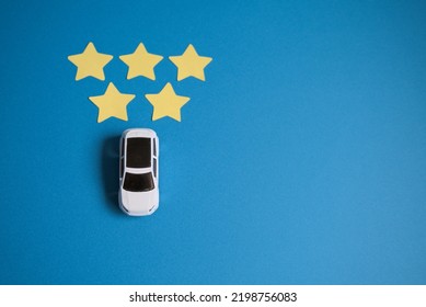 Overhead Photo Of The Left Side Of The Car, Five Stars And A Blue Background