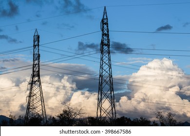 Overhead Power Lines In A Cloudy Winter Sky