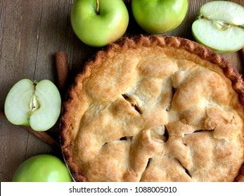 Overhead Shot Of An Apple Pie On A Rustic Wood Surface